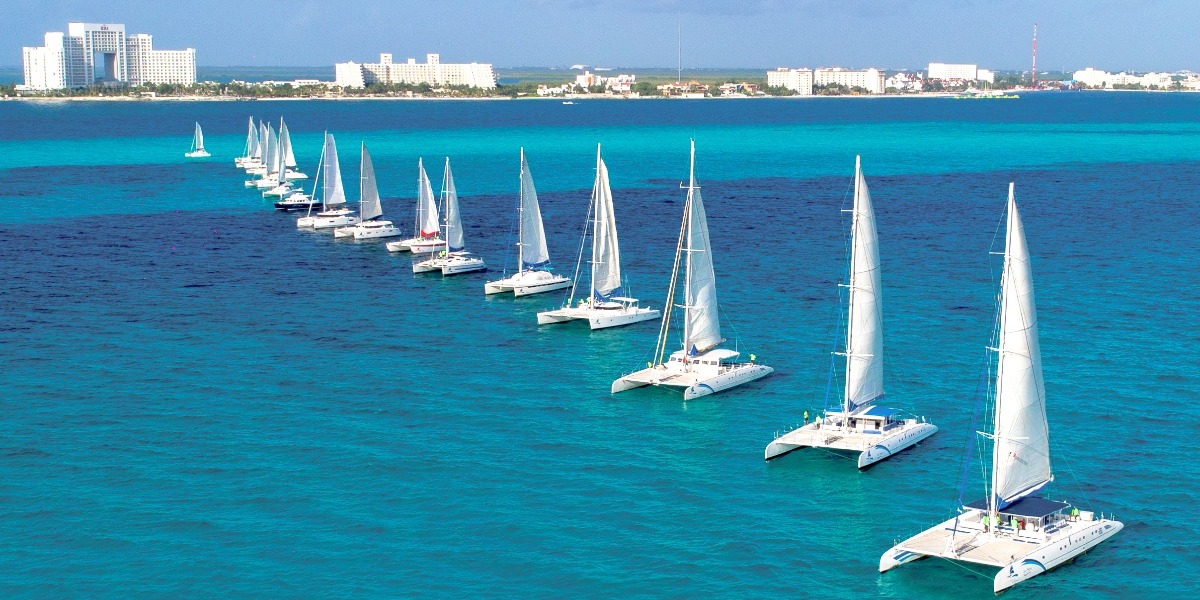 Cancun Sailing Blue Flag boats